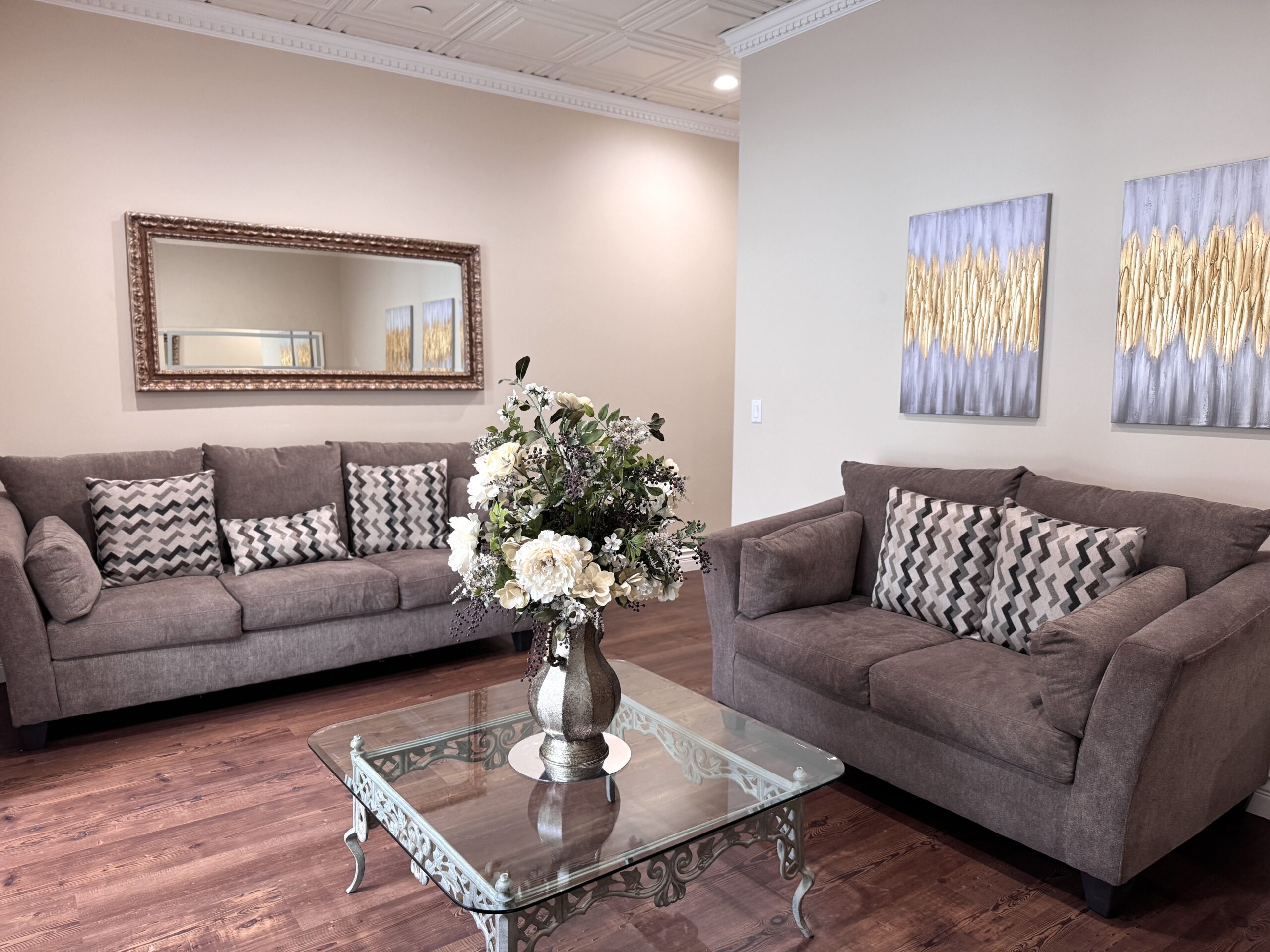 Elegant living room with gray sofas.