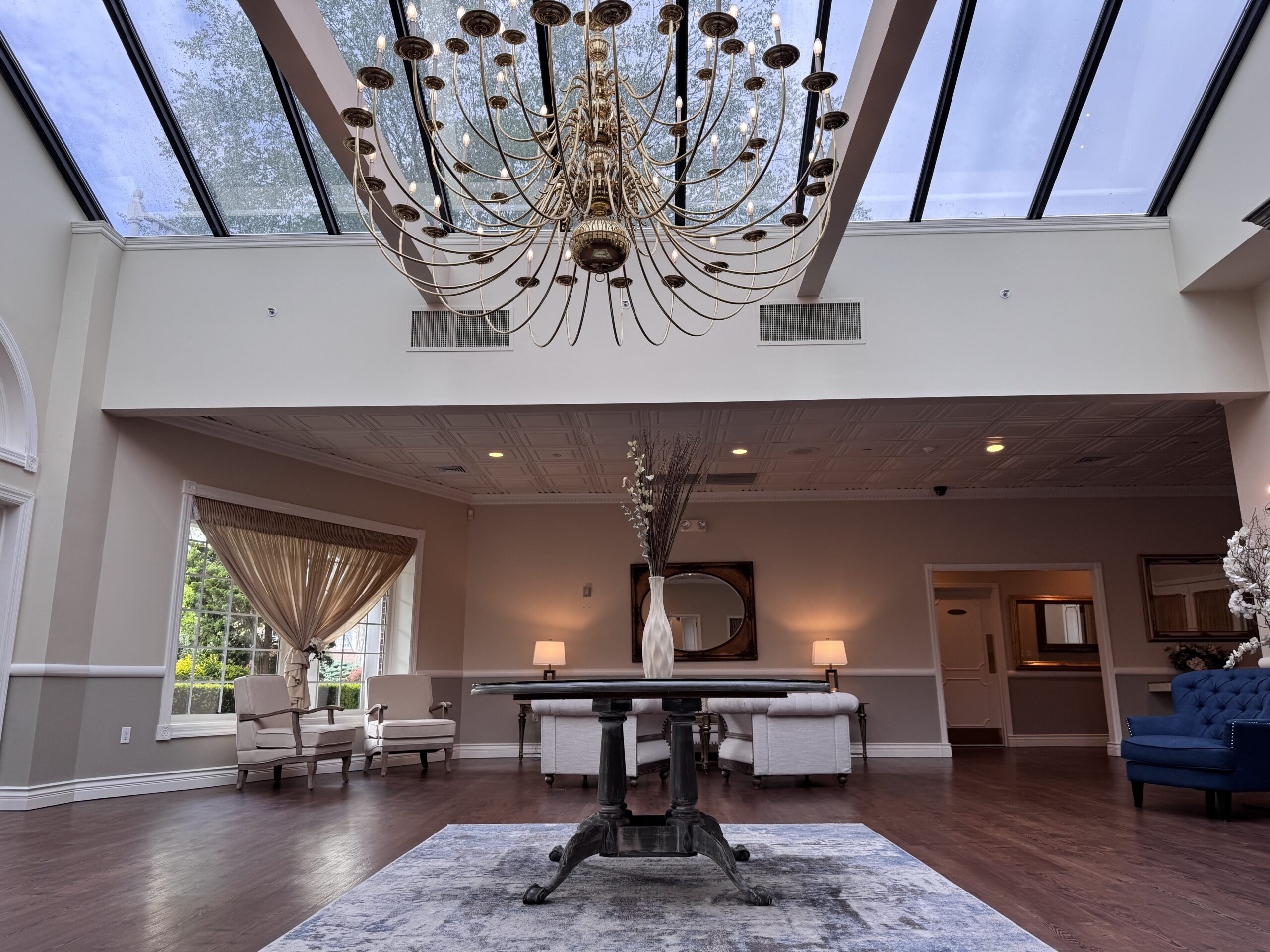 Elegant lobby with grand chandelier.
