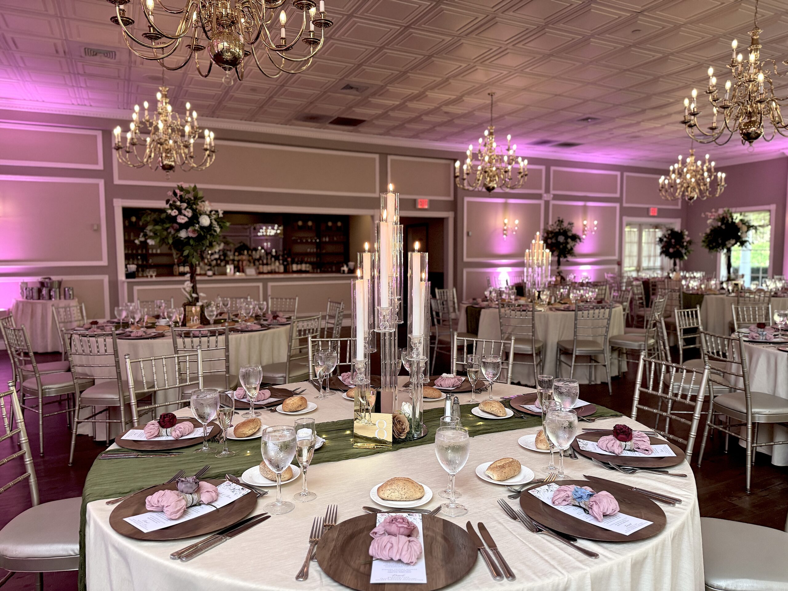 Elegant wedding reception setup with candles.
