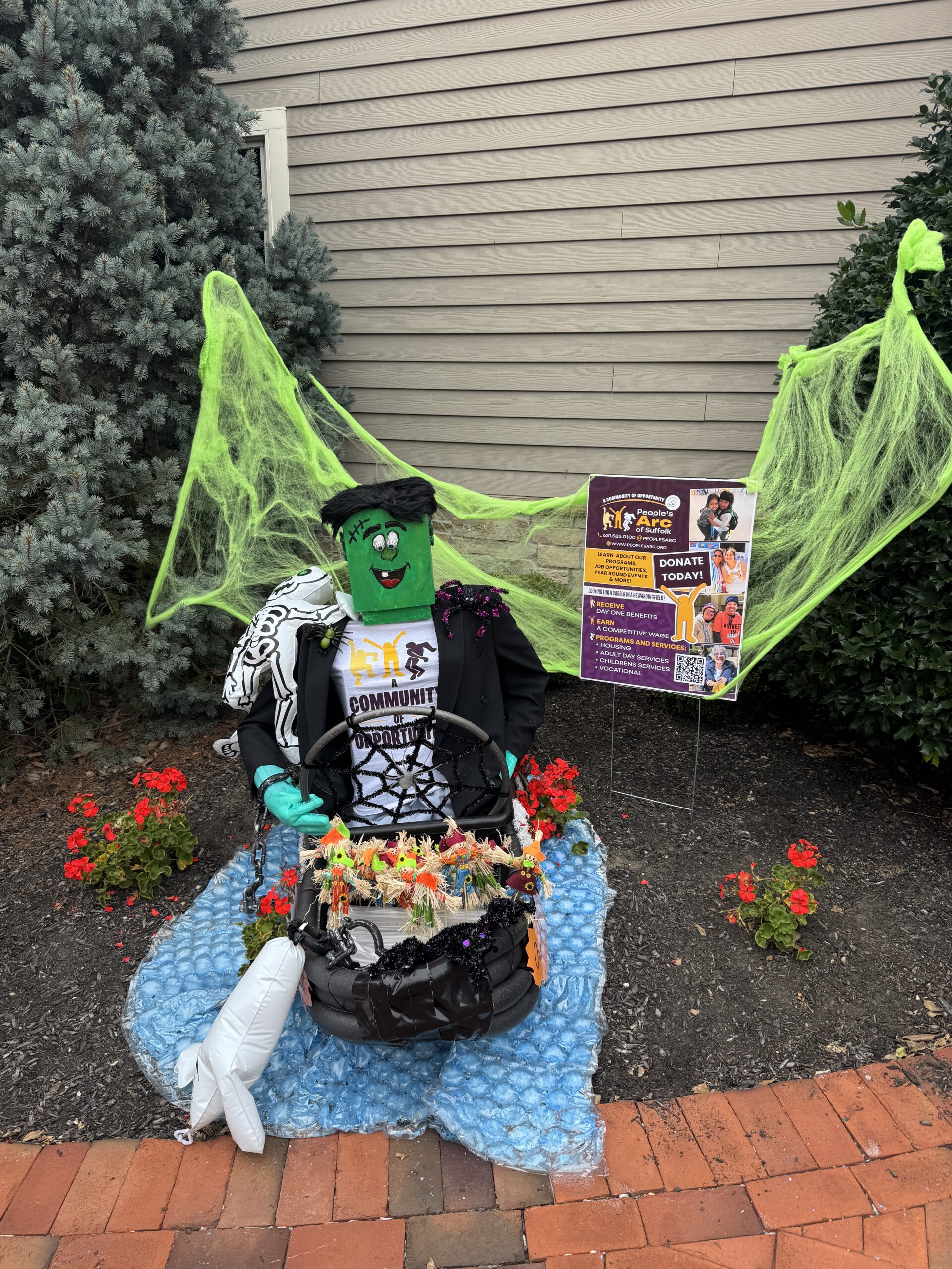 Halloween display with green monster figure.