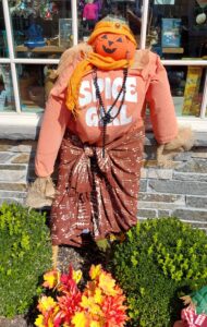 Pumpkin scarecrow with Spice Girl shirt