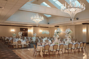 Elegant wedding venue with chandeliers.