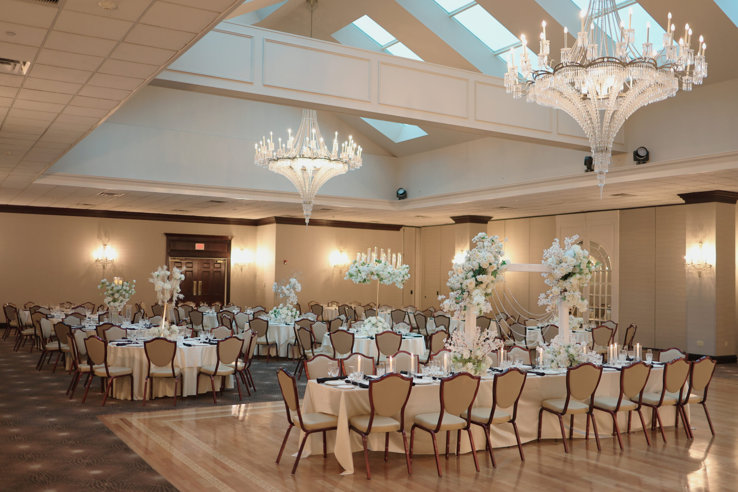 Elegant wedding venue with chandeliers.