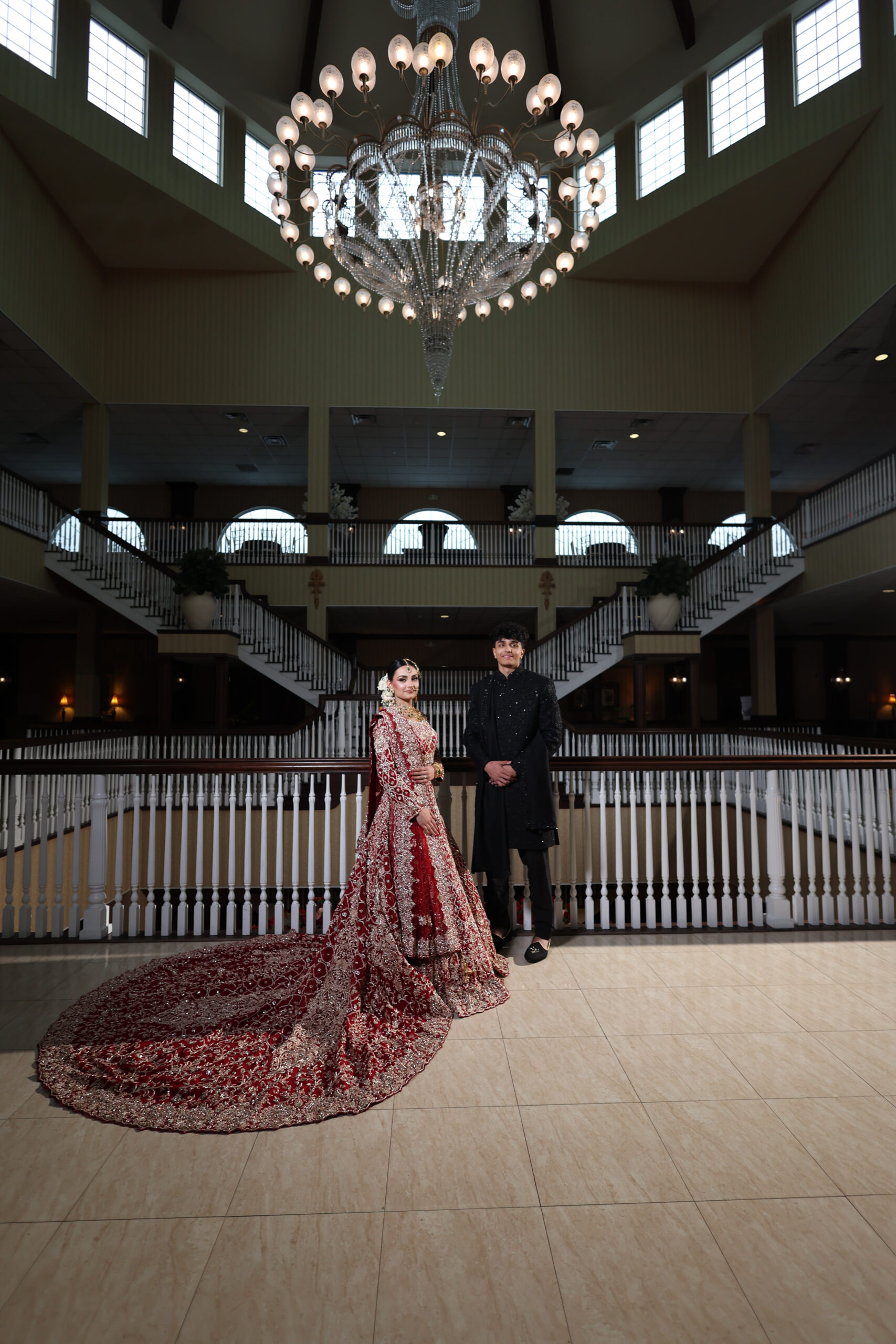 Elegant couple under chandelier