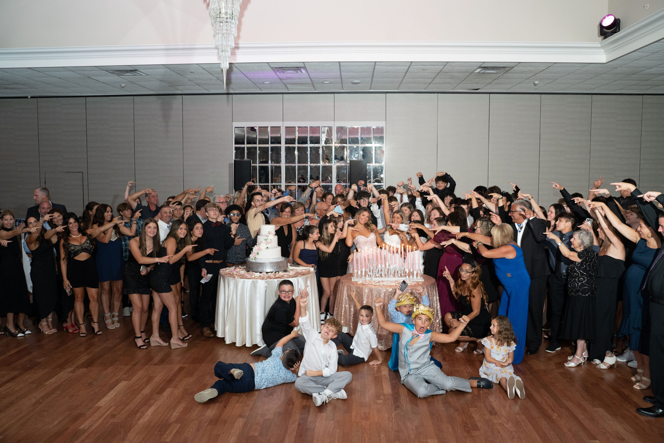 Celebration with friends around a birthday cake.