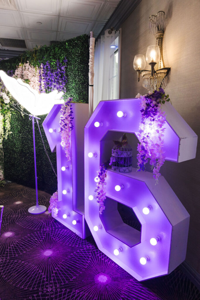 Bright purple 16 decor with flowers.