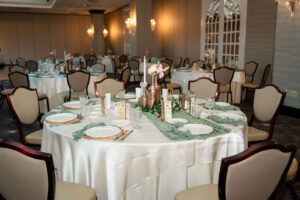 Elegantly set round wedding table.