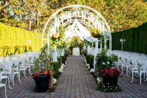 Outdoor wedding venue with elegant arch.