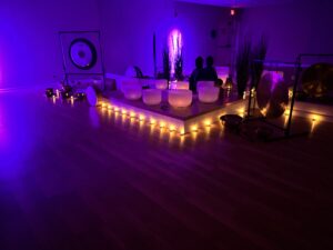 Meditation room with glowing purple lights