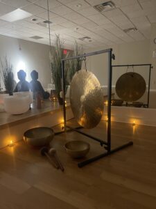 Meditation room with gongs and candles.